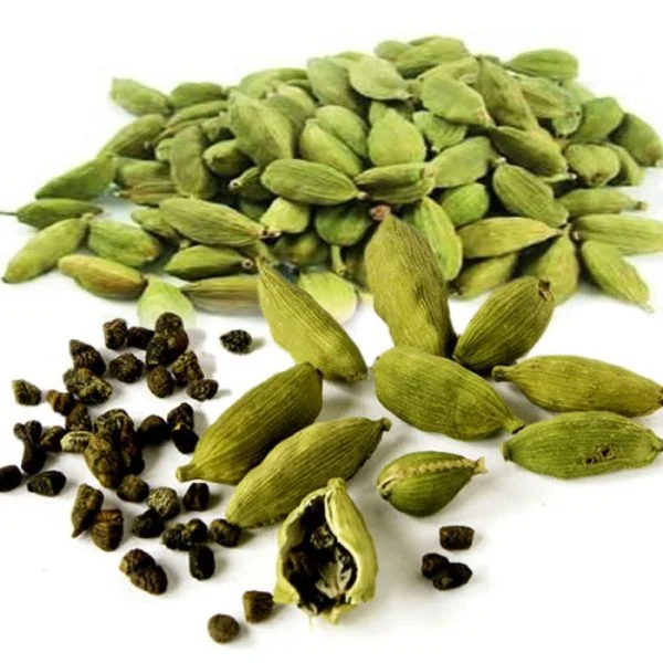 Buy Elakai (Cardamom) Online | Aromatic &Amp; Versatile Spice. Green And Black Cardamom Pods From Dm Traders Organic Store On A White Background.