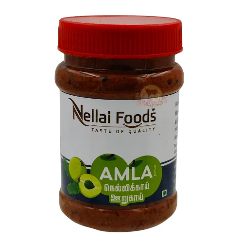 Jar Of Nellai Foods Amla Pickle With A Red Cap, Labelled In English And Tamil.