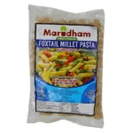 Packet Of Marudham Foxtail Millet Pasta With A Colourful Image Of Pasta On The Front And Nutritional Information Printed Below.